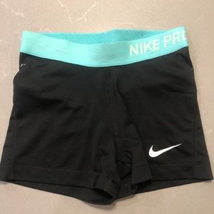 Black and blue Nike Pro shorts